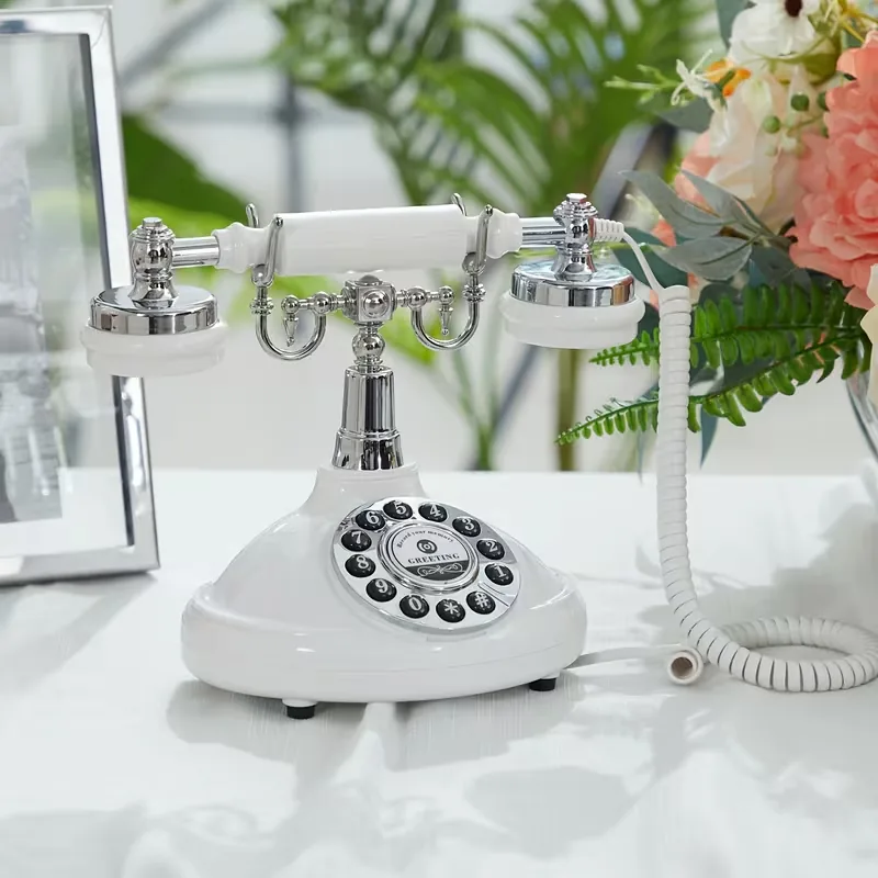 Téléphone vintage blanc du livre d'or audio